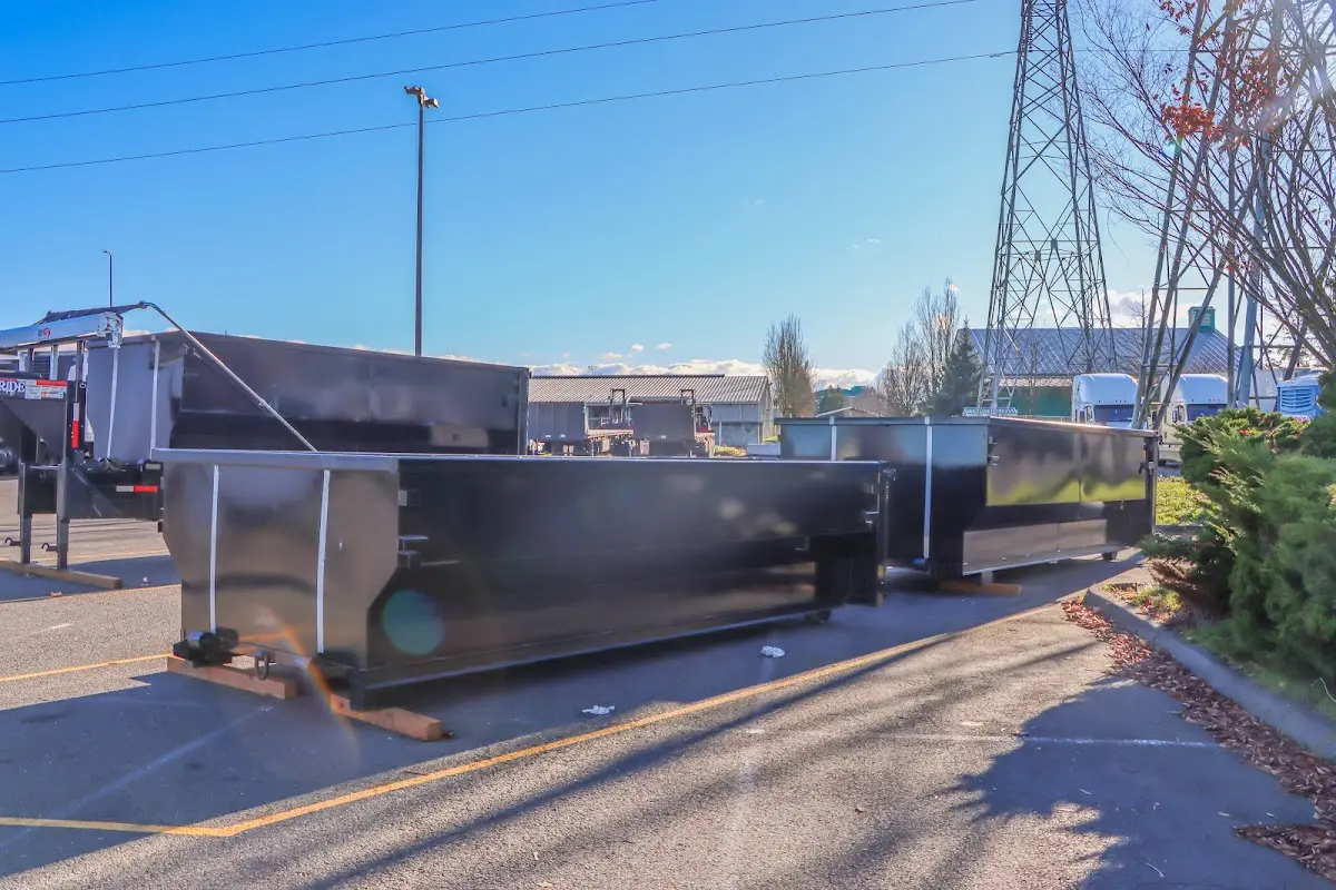 Roll-off dumpster ready for waste disposal at job site for Concrete Dumpster Rental in Watauga